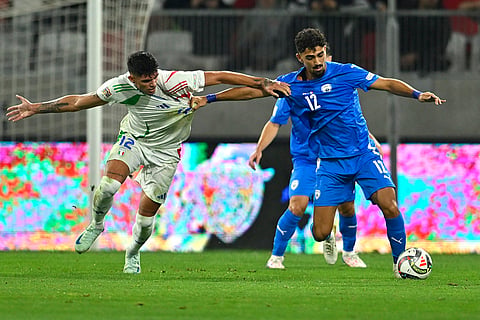 2024–25 UEFA Nations League, Israel vs Italy: Italy's Raoul Bellanova, left, challenges for the ball with Israel's Roy Revivo 